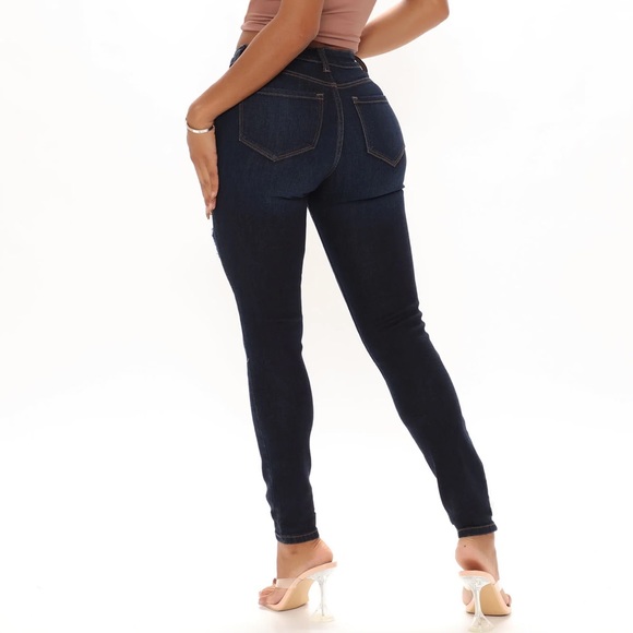 Dark wash ripped mid rise skinny Jean - Picture 3 of 4